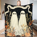 Halloween ghost bed sheets showcasing two draped figures amidst autumn pumpkins and starry skies.