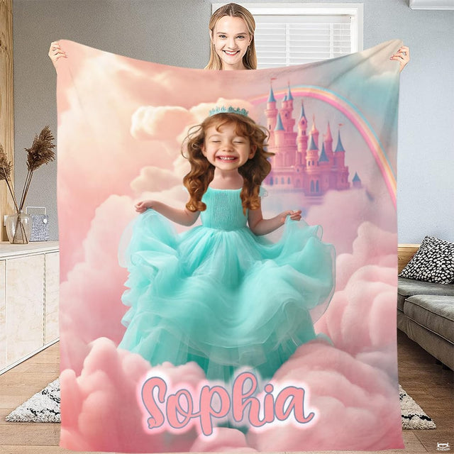 Close-up perspective of crystal tiara and ruffled turquoise ballgown on princess blanket