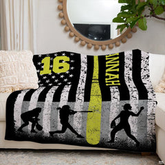 Living room sofa display showcasing the softball flag artwork beneath a round wall mirror.