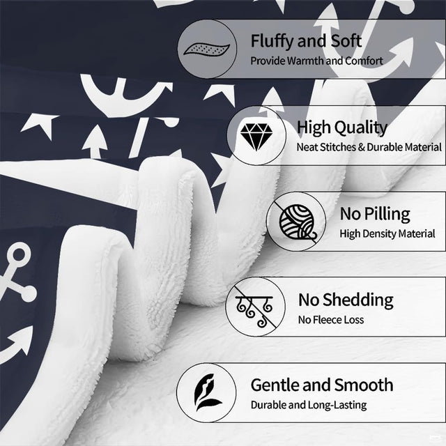 Close view of ship helm rope-wound anchor and nautical star motifs on blanket