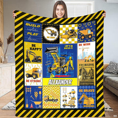 Patchwork vehicle theme layout with yellow diggers and checkered geometric patterns.