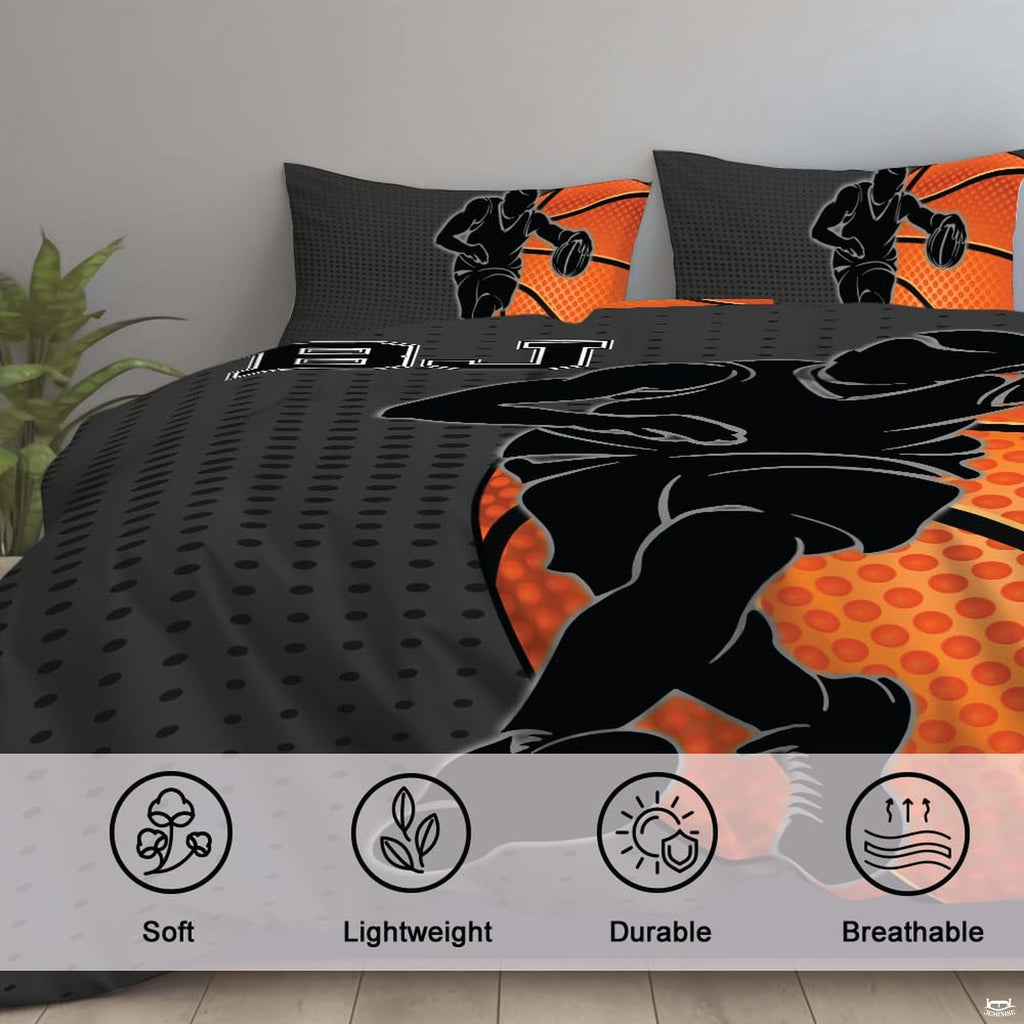 Corner angle view of athletic bedding illustrating crisp graphic contrast between orange and charcoal gray
