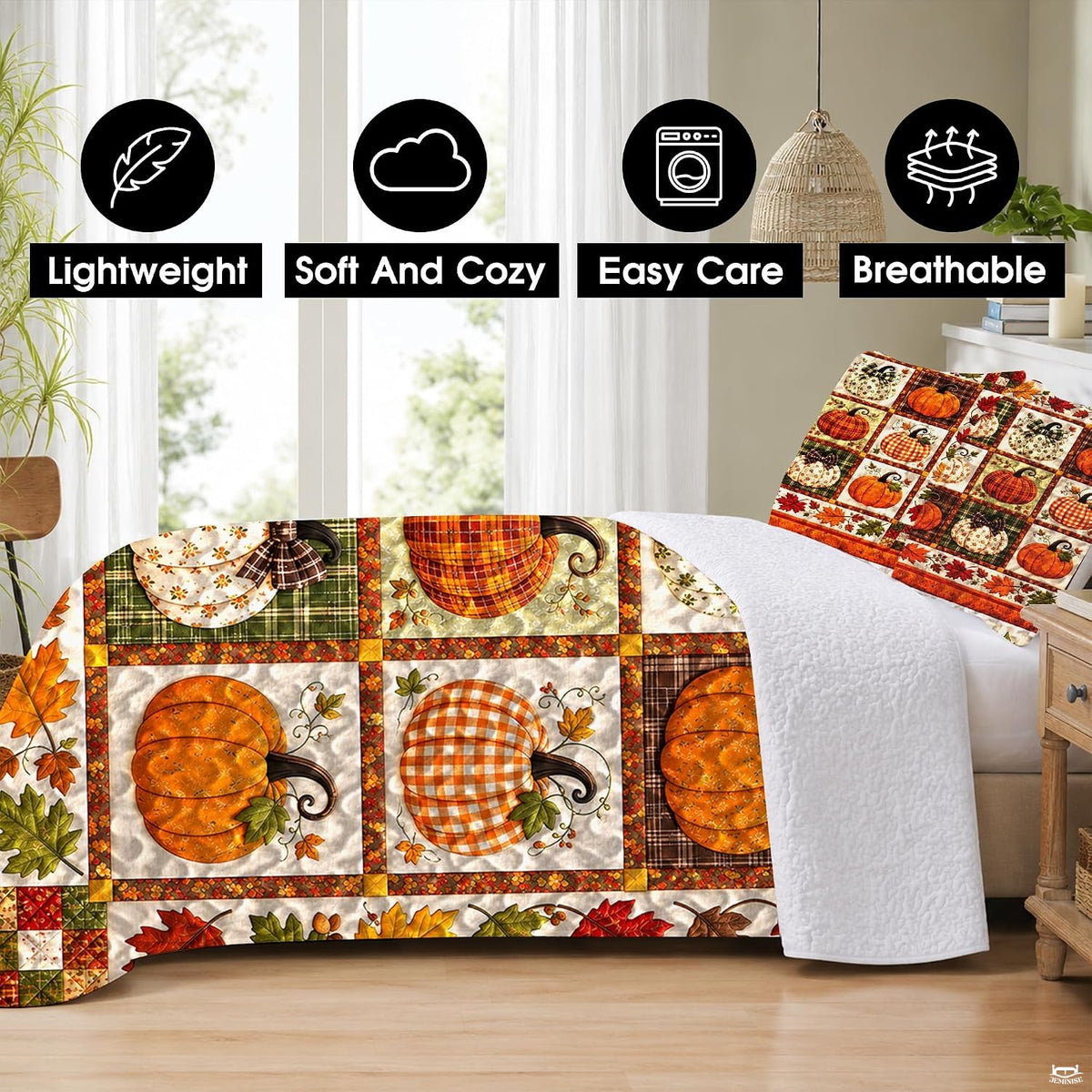 Matching pillow shams displaying miniature patterned pumpkins and autumn foliage on a bedding set
