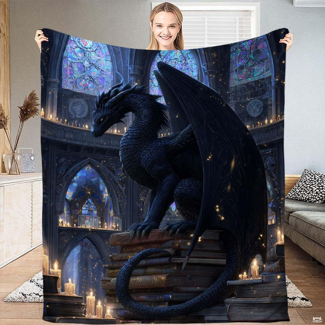 Gothic black dragon perched on antique books in candlelit cathedral library throw blanket