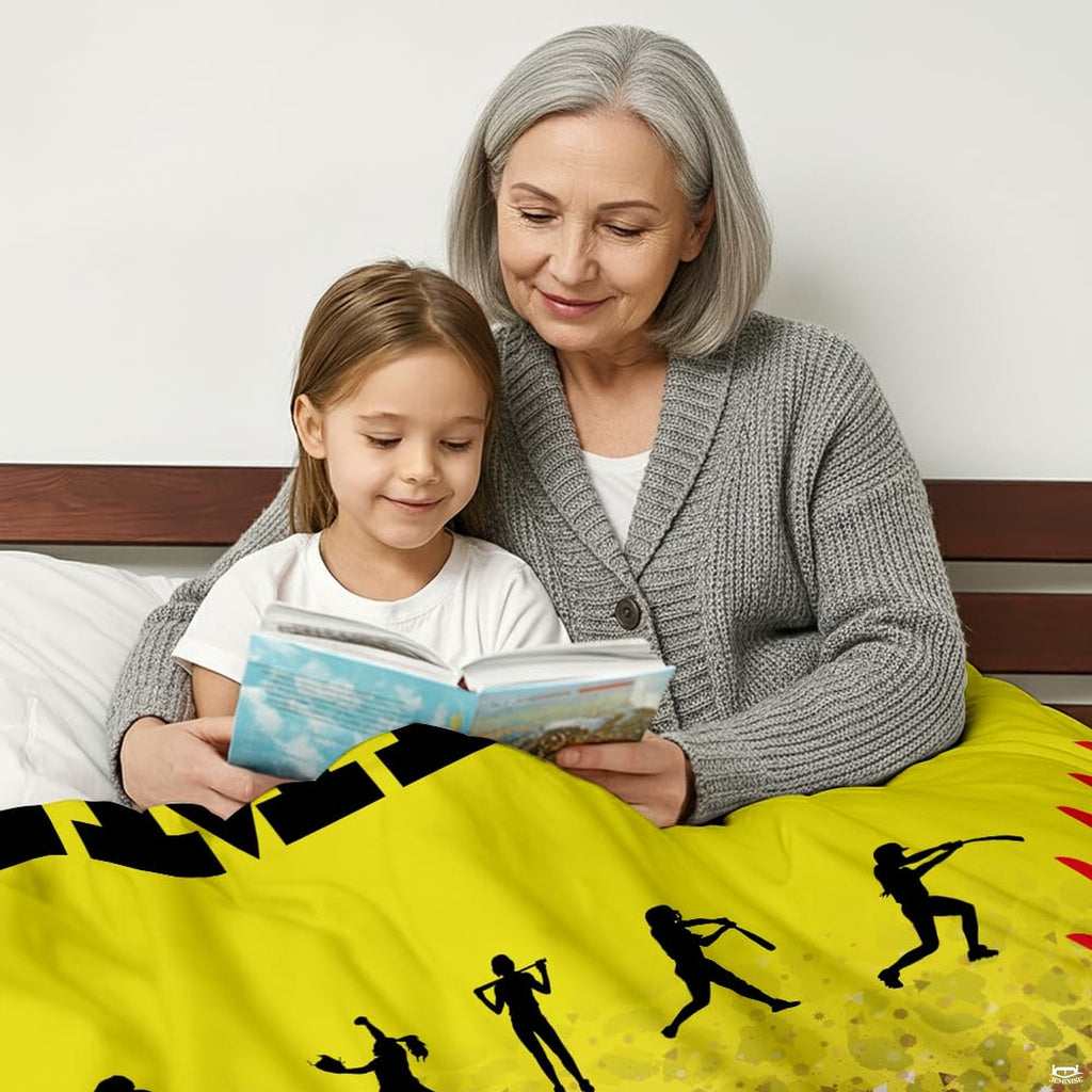 Athletic yellow softball player graphic blanket draped across bedroom bed