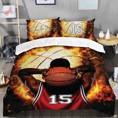 Close-up perspective of sports bedding detailing roaring golden fire, orange basketball, and red jersey mesh