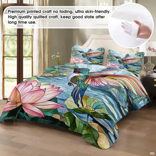 Vibrant mosaic artwork depicting a flying hummingbird above tranquil green lily pads in jewel tones.