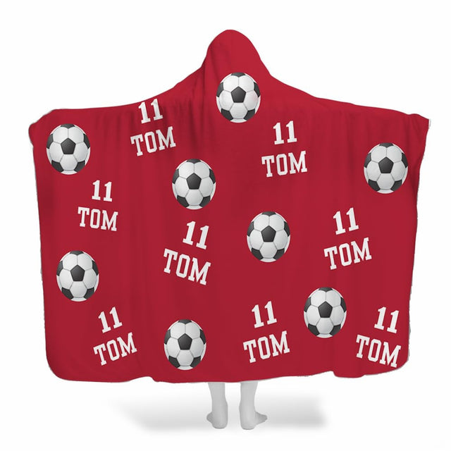 Soccer balls navy blue hooded blanket displayed from behind