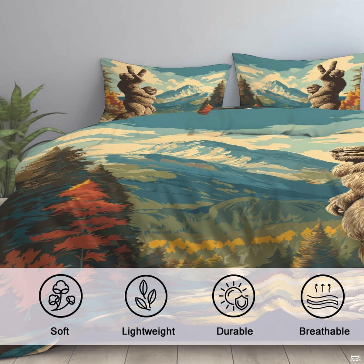 High-angle view of bigfoot graphic bedding showing rich slate teal, sage green, and moss tones across bed.