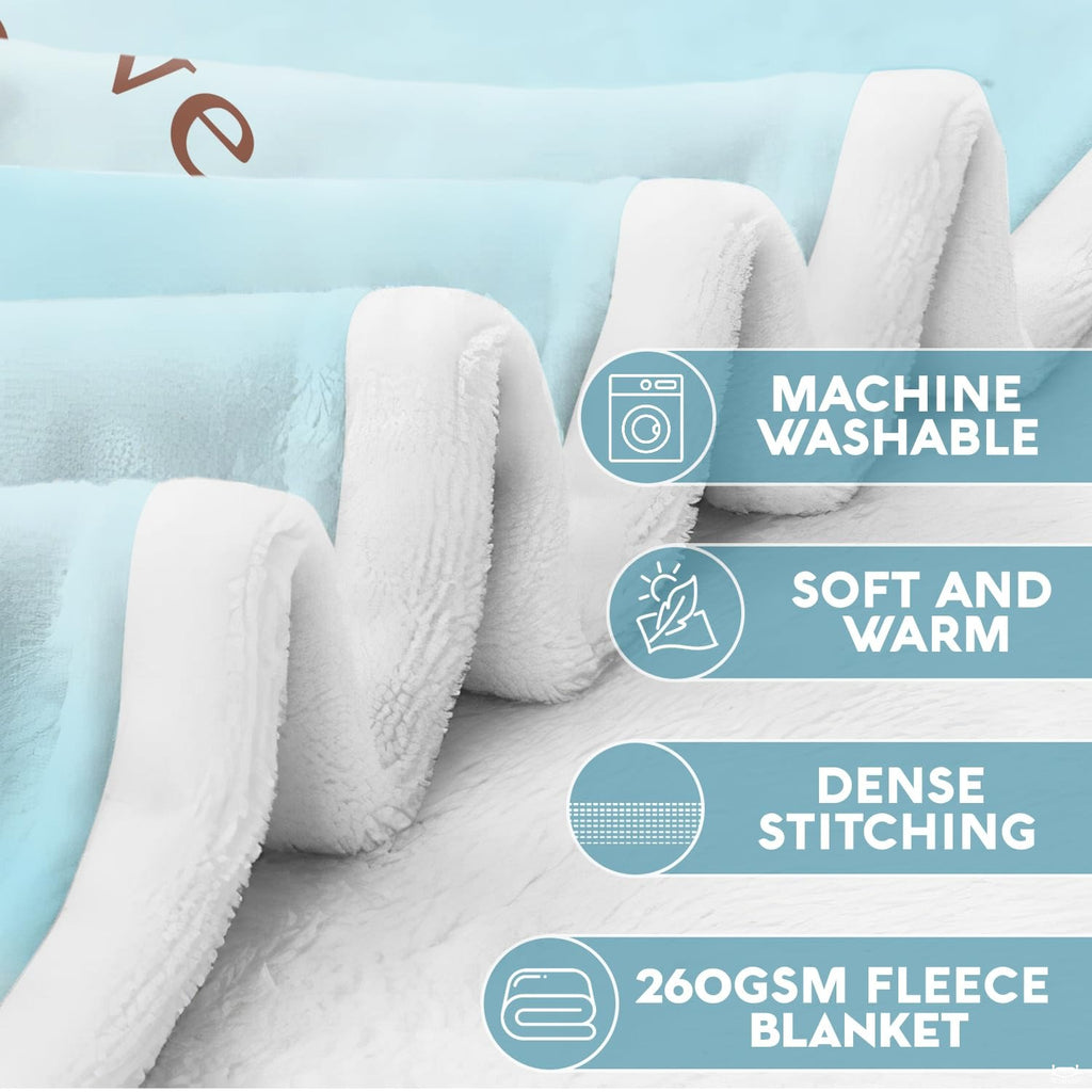 Luminous portrait composition on halo bedding set surrounded by soothing blue clouds.