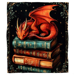 Close view of red dragon scales, wings, and gilded book spine details
