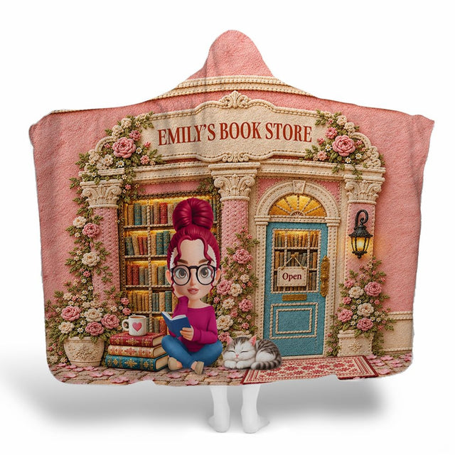 Close-up perspective of illustrated student and sleeping cat on bookstore blanket