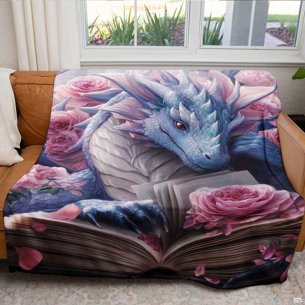 Fantasy dragon artwork with pink roses styled on indoor seating by a window