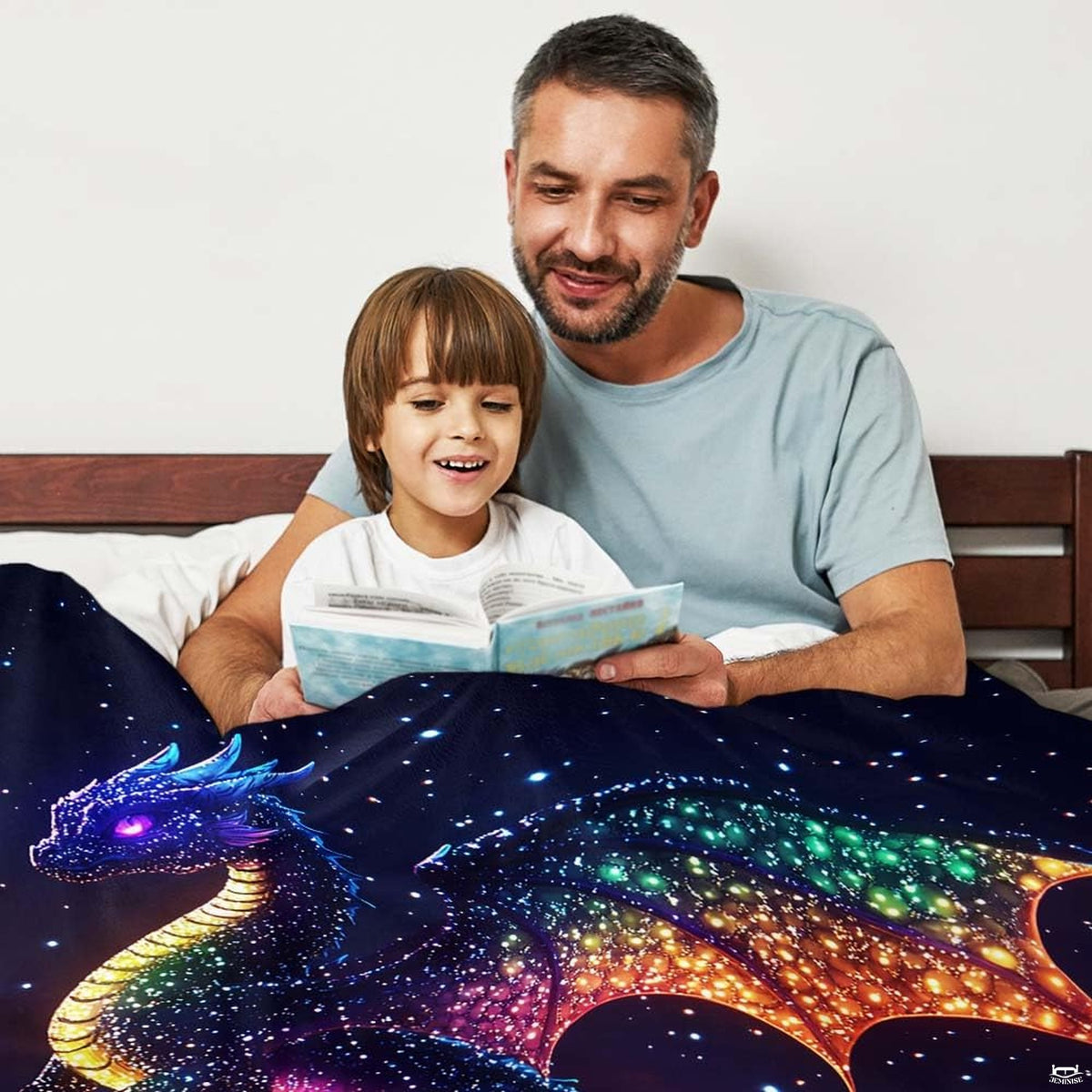 Neatly folded celestial dragon throw blanket displayed on wooden surface showcasing clean edge borders