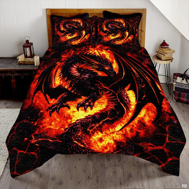 Black fire dragon coiled amid orange flames displayed across a bed and pillows