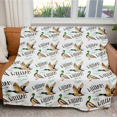 Close-up of mallard duck illustrations featuring orange webbed thematic accent, rich green heads, and green foliage prints