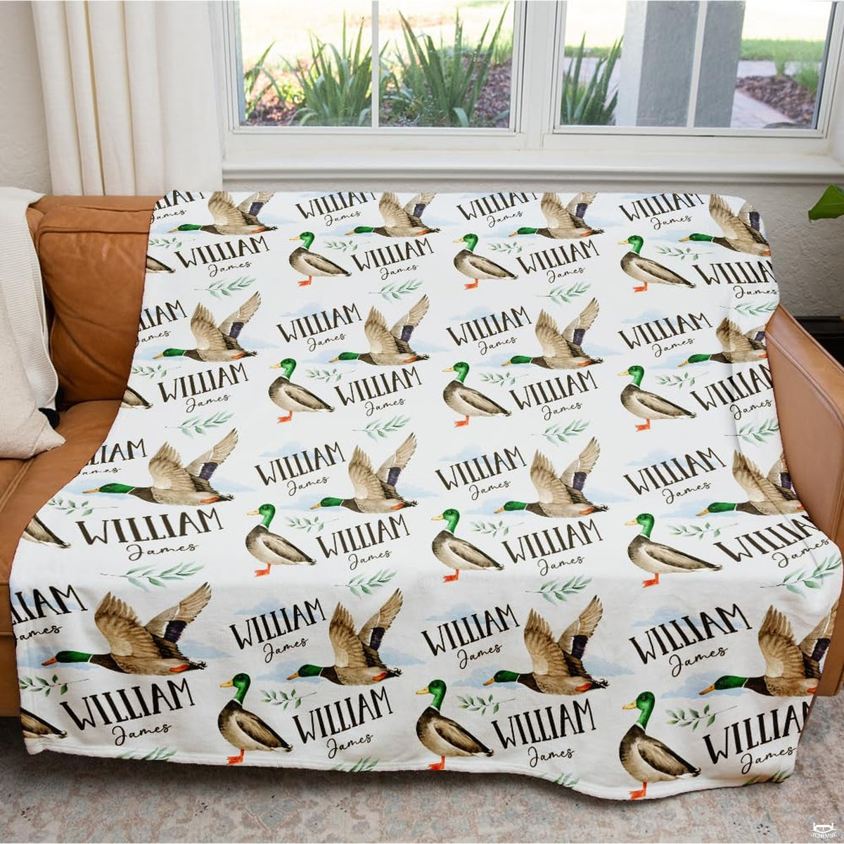 Close-up of mallard duck illustrations featuring orange webbed thematic accent, rich green heads, and green foliage prints