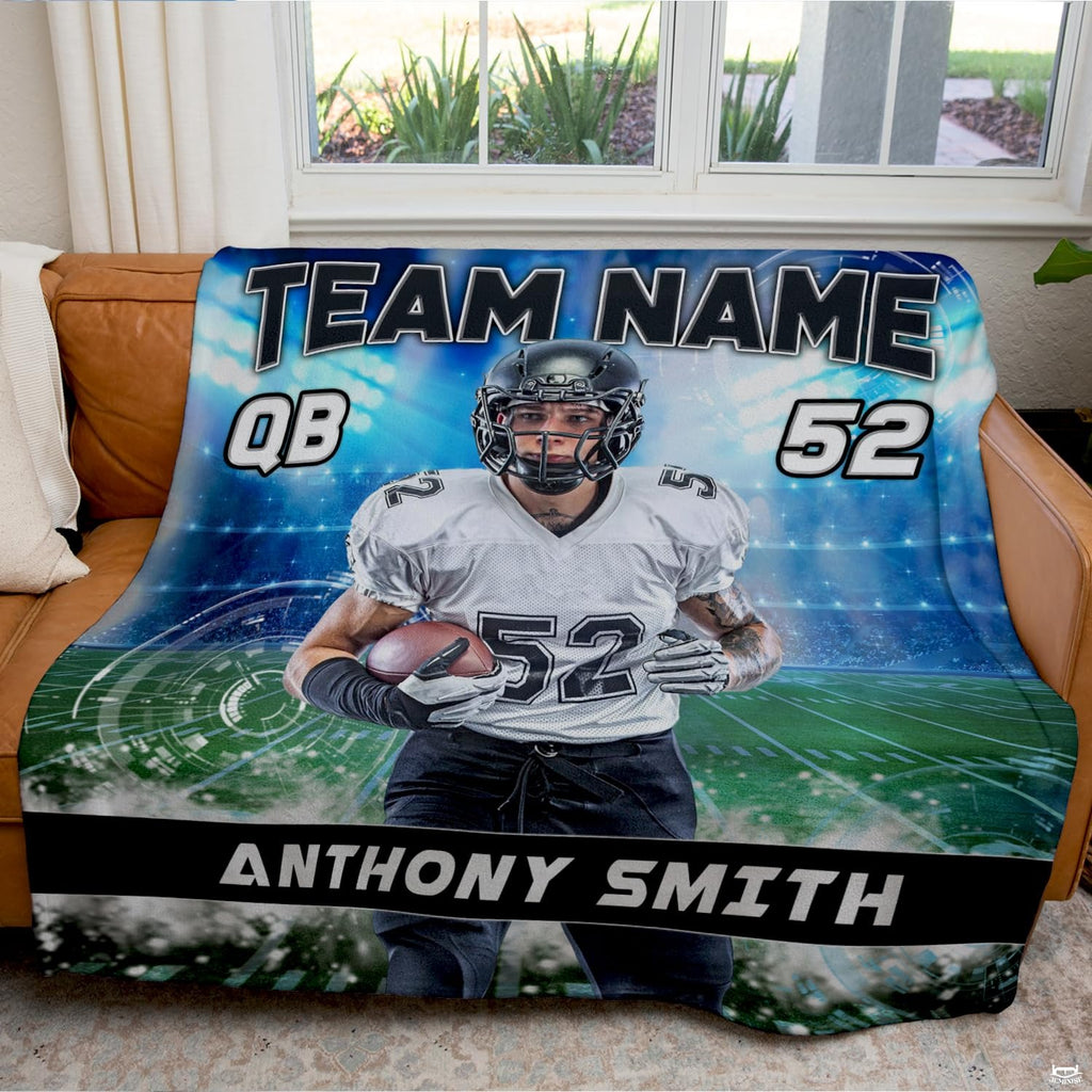 Quarterback football throw blanket view 7 highlighting athletic runner, green field turf, and stadium floodlights