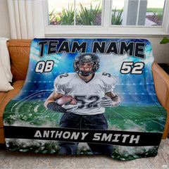 Quarterback football throw blanket view 7 highlighting athletic runner, green field turf, and stadium floodlights