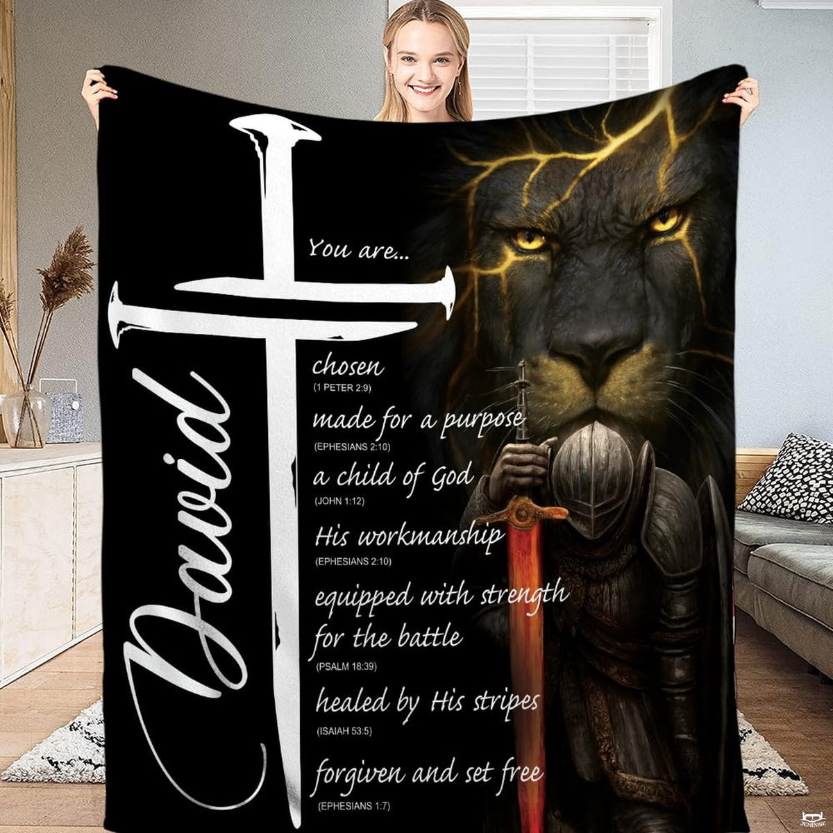 Bedding displaying a dark lion with gold glowing veins, an armored knight with fiery sword, and white cross.