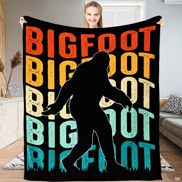 Monster bedding set featuring walking sasquatch silhouette over retro sunset gradient stripes on black backdrop.