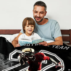 Sprinting gridiron athlete graphic blanket arranged over living room armchair