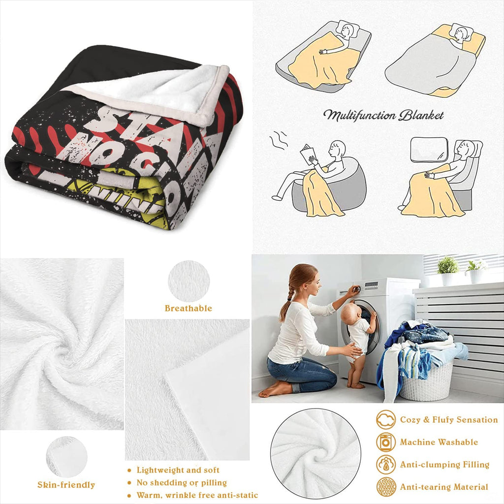 Neatly folded motivational softball throw blanket displayed on wooden surface showcasing clean edge borders