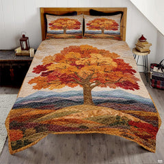 Vintage autumn maple leaf and pumpkin bedding set showcasing rustic fall foliage patchwork in rich burnt orange tones.