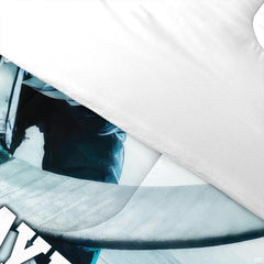 Folded presentation of ice hockey bedding displaying sharp graphic clarity in vibrant teal and navy tones