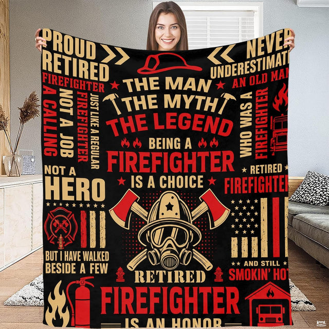 Detailed view of firefighter helmet, respirator mask, and crossed axe emblems on Blanket.