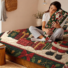 Overhead perspective of Santa Claus bed artwork surrounded by seasonal holiday borders.