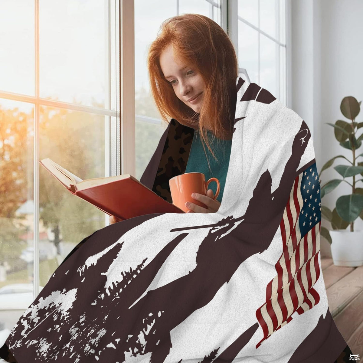 Patriotic Bigfoot throw blanket styled around a person reading by a window.