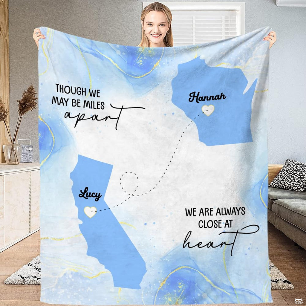 Flat display of long distance friendship map pink throw blanket showing full geographic artwork