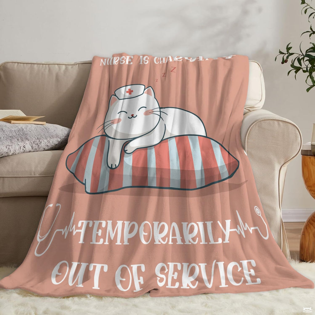 Angle view of nurse cat cartoon throw blanket showing crisp edges and dusty rose background
