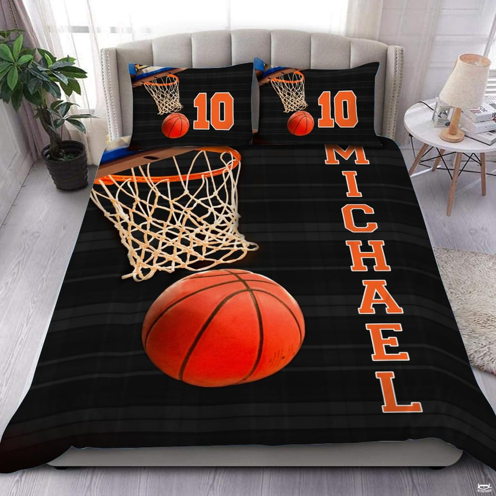 Basketball rim and net bedding featuring an orange ball dropping through white netting on striped background