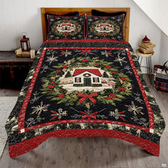 Winter cottage bedding set showcasing an illustrated snow-covered house inside an evergreen wreath with red bows.
