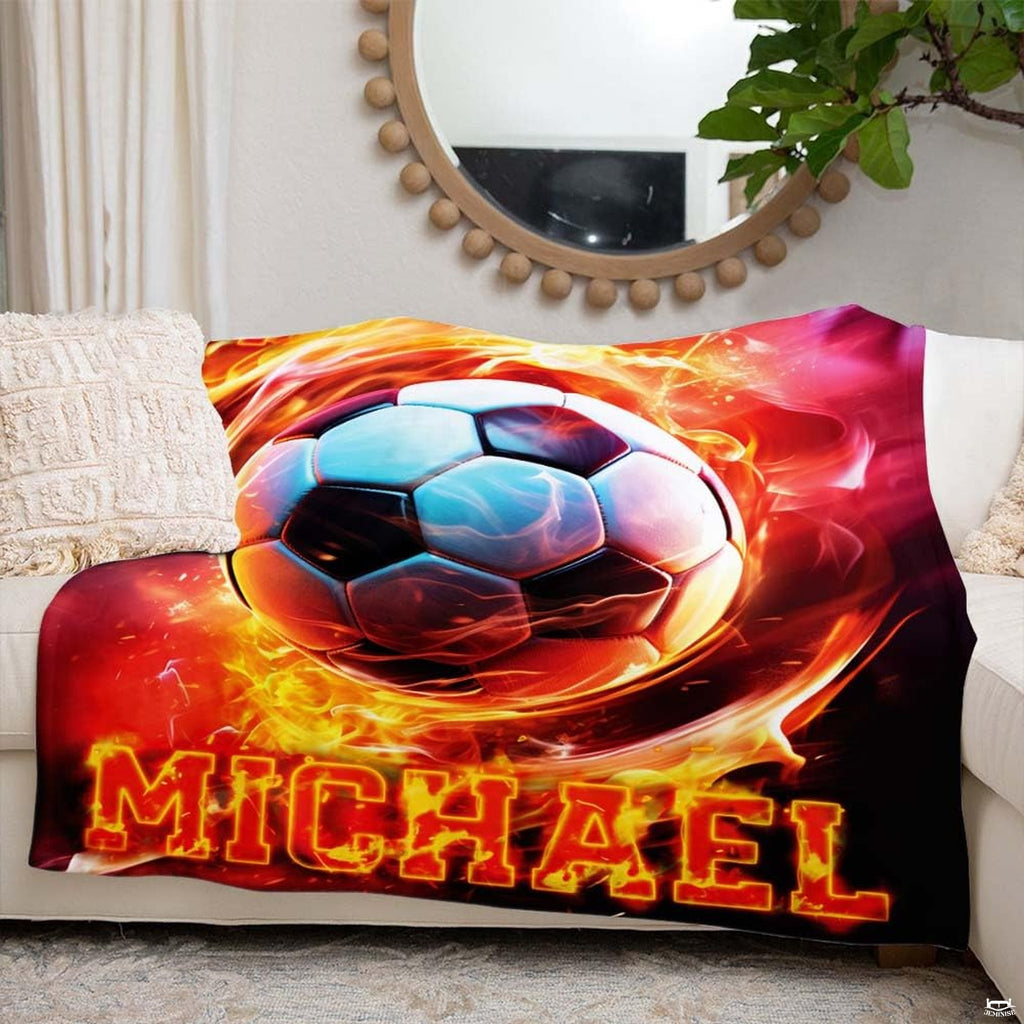 Living room couch arrangement highlighting the complete fiery soccer vortex graphic print.
