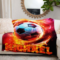 Living room couch arrangement highlighting the complete fiery soccer vortex graphic print.