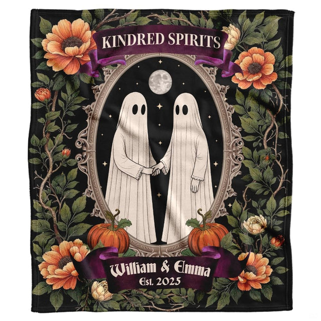 Gothic ghost couple holding hands within an ornate floral mirror frame on a dark throw blanket