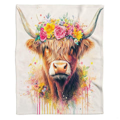 Floral crown Highland cow throw blanket view 2 styled on living room couch in farmhouse home