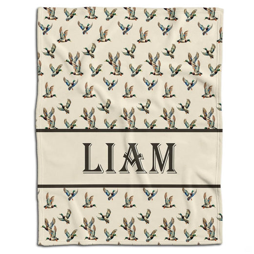 Watercolor flying mallard duck bedding set displayed in a rustic woodland bedroom setting.