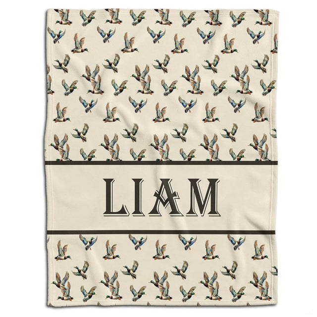 Watercolor flying mallard duck bedding set displayed in a rustic woodland bedroom setting.