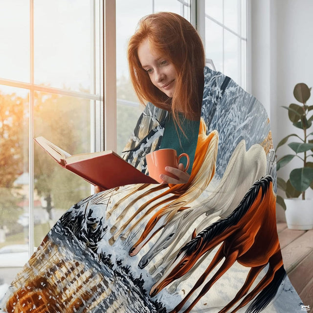 Living room interior display showing the winter equine landscape throw blanket draped across furniture.
