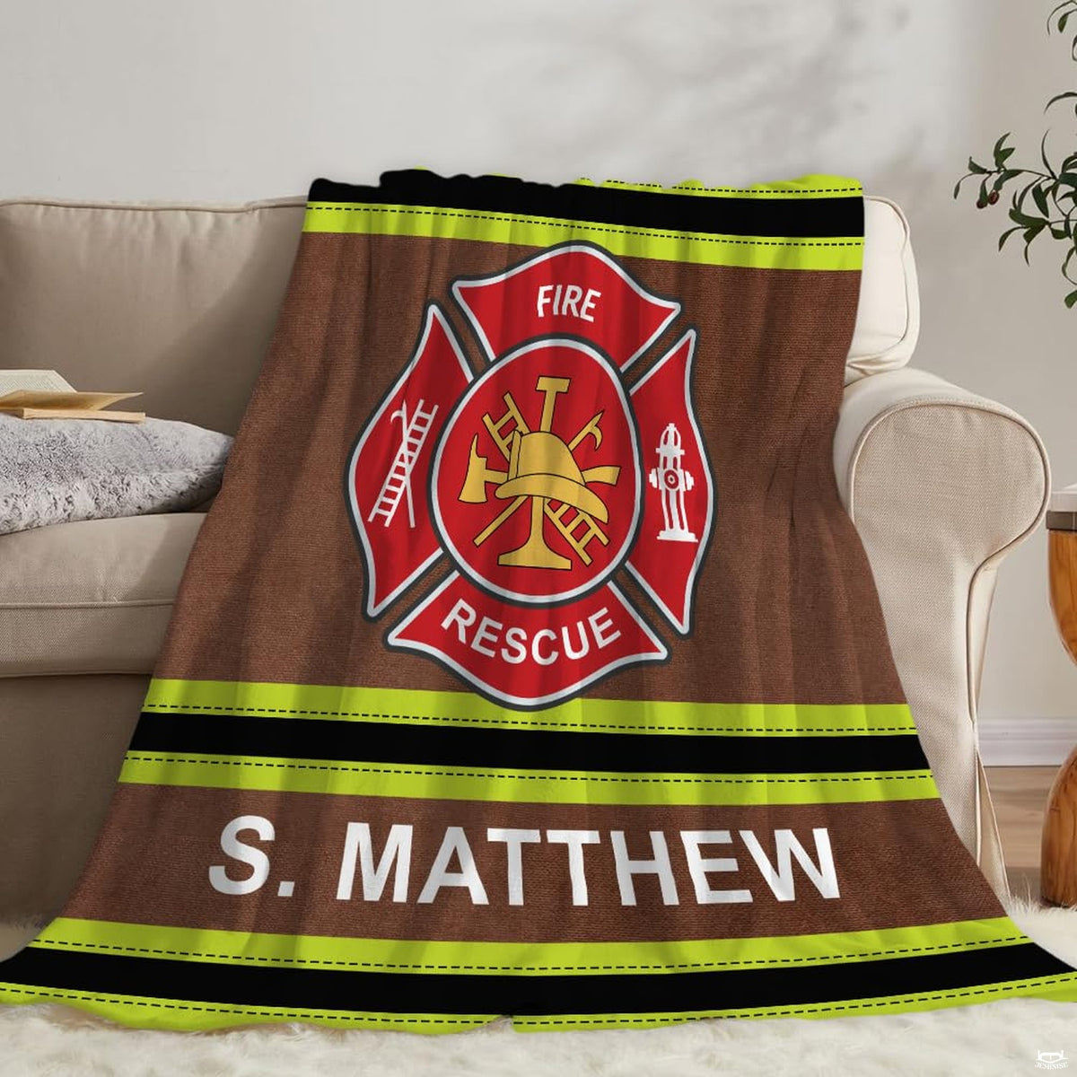 Firefighter turnout gear throw blanket folded neatly on a modern sectional