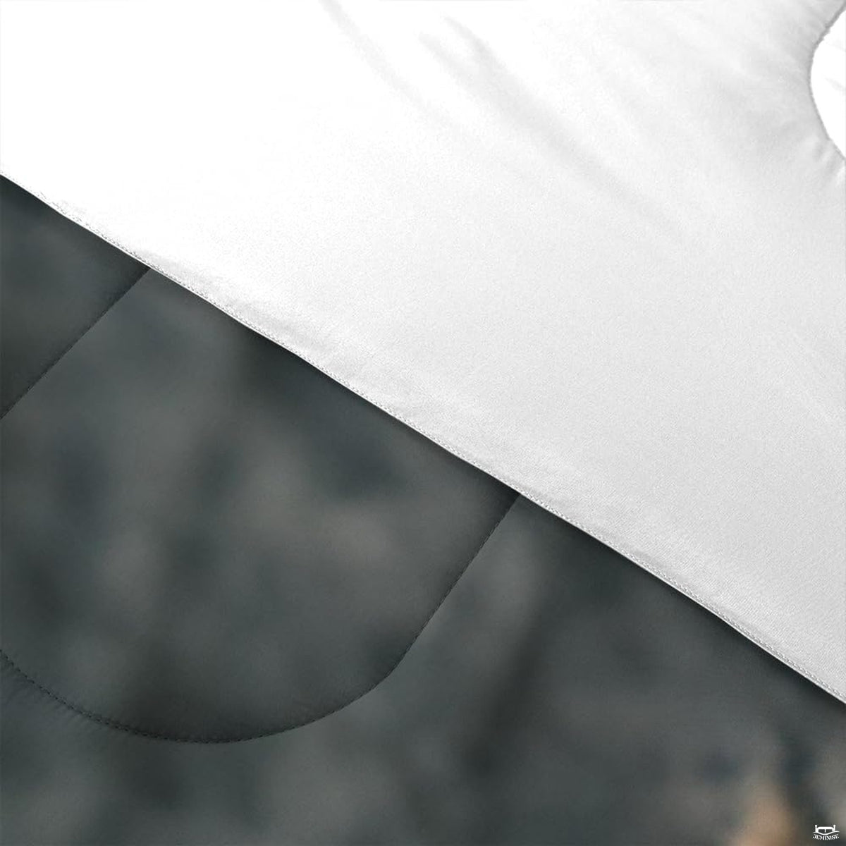 Folded presentation of ice hockey bedding displaying sharp graphic clarity in charcoal and slate tones