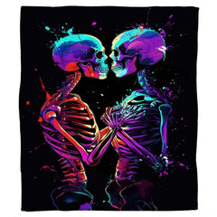 Neon paint splatter skeleton throw blanket draped across living room armchair