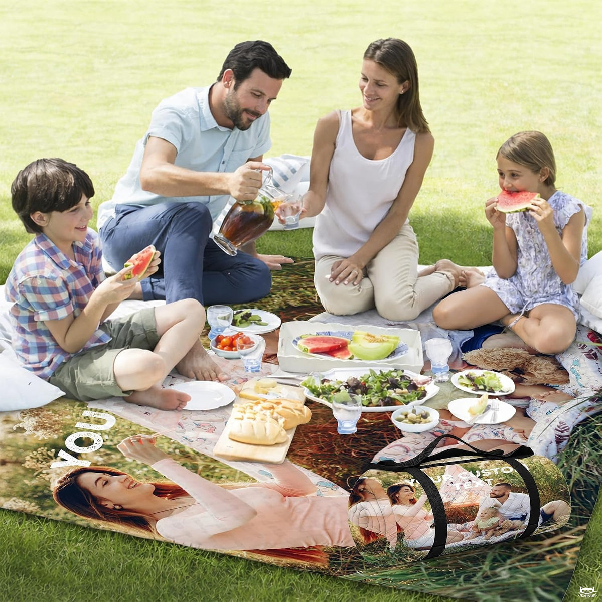 Woman holding open family photo meadow picnic blanket on sunny ocean shoreline