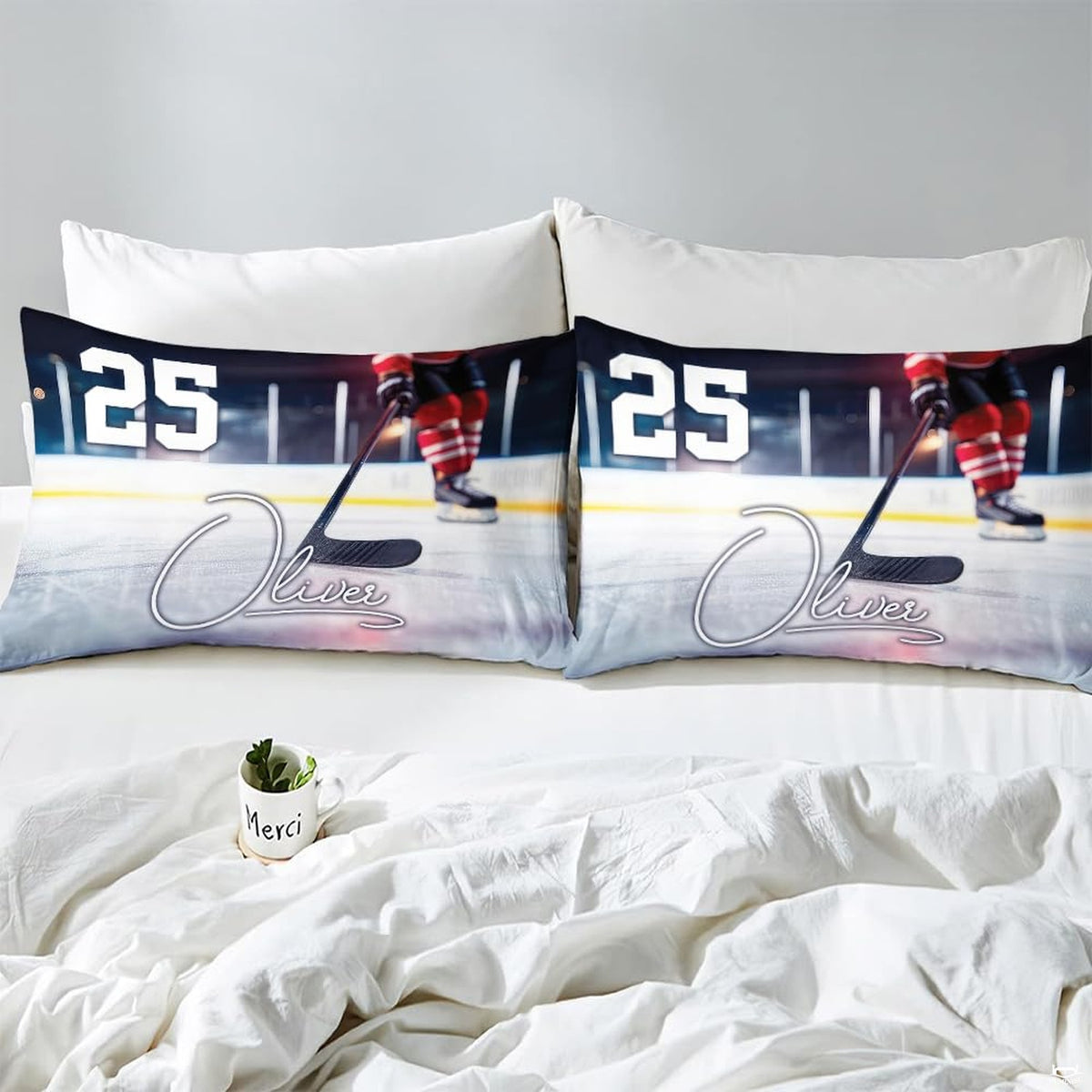 Side angle view of athletic winter sports bedding showing plum purple and crimson red tones on mattress