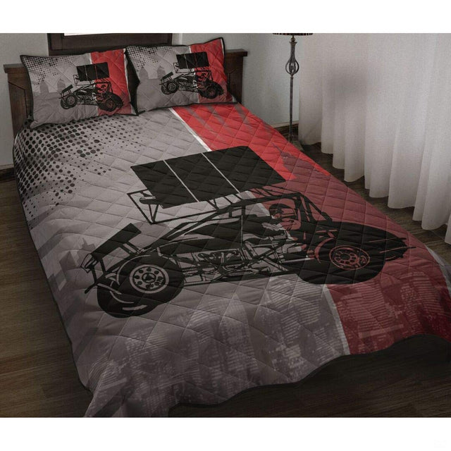 Red and grey sprint car dirt racing bedding set displayed flat across a bed in a modern motorsport bedroom