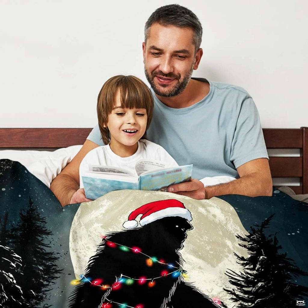 Bigfoot in a Santa hat wrapped in colorful Christmas lights under a full moon, view 3.